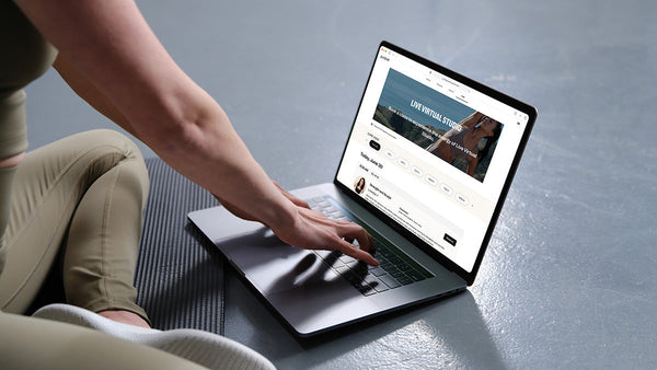 Woman selecting her workout | P.volve