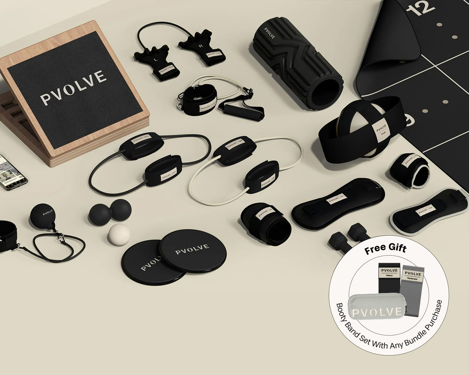 Collection of P.volve fitness equipment including weights, resistance bands, and exercise accessories.